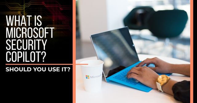 Closeup of hand typing on a Windows Surface. A Microsoft branded paper cup sits next to the Surface. Text reads, "What Is Microsoft Security Copilot? Should You Use It?"